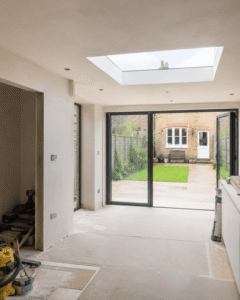 Interior finishing stage with rooflights and large garden doors